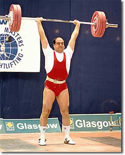 David Meltzer - Completing a clean and jerk of 135 kg (298 lbs) at the 1999 World Masters Weightlifting Championships in Glasgow, Scotland